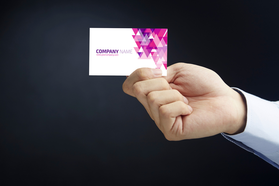 Hand presenting business card concept