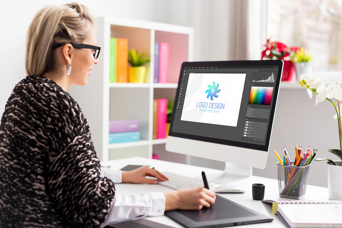 Graphic Design Artist Working on Client's Logo Design